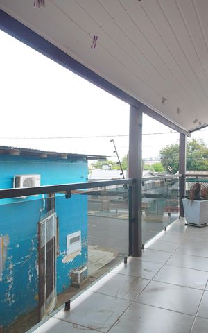 Casa à venda com 250m², 3 quartos e 2 vagasvaranda da sala 2