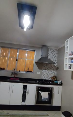 Casa à venda com 136m², 4 quartos e 2 vagas Casa à venda com 136m², 4 quartos e 2 vagasCozinha