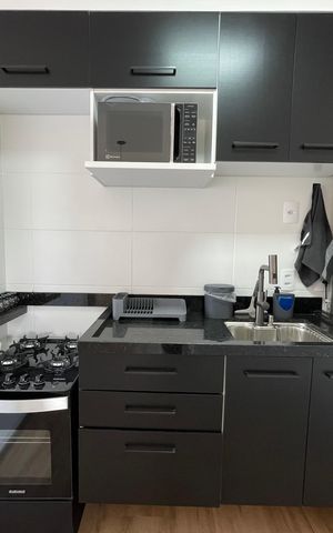 Apartamento à venda com 37m², 2 quartos e 1 vaga Apartamento à venda com 37m², 2 quartos e 1 vagaCozinha e Área de Serviço