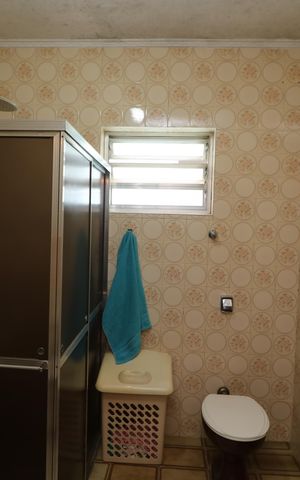 Casa à venda com 170m², 3 quartos e 2 vagasBanheiro