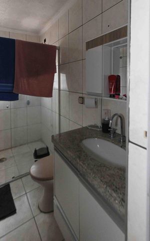 Casa à venda com 148m², 3 quartos e 2 vagasBanheiro da Suite