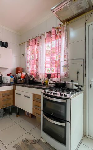 Casa de condomínio à venda com 60m², 2 quartos e 1 vaga Casa de condomínio à venda com 60m², 2 quartos e 1 vagaCozinha