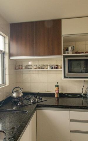 Apartamento à venda com 50m², 3 quartos e 1 vaga Apartamento à venda com 50m², 3 quartos e 1 vagaCozinha e Área de Serviço