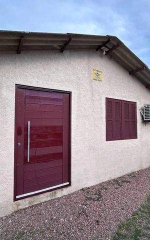 Casa à venda com 110m², 3 quartos e 1 vaga Casa à venda com 110m², 3 quartos e 1 vagaFachada