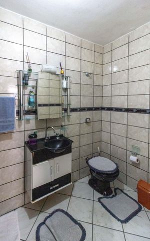 Casa à venda com 240m², 4 quartos e 3 vagasBanheiro