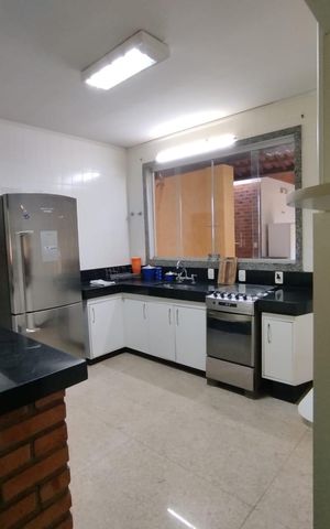 Casa de condomínio à venda com 400m², 4 quartos e 4 vagas Casa de condomínio à venda com 400m², 4 quartos e 4 vagasCozinha
