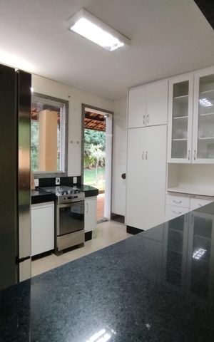 Casa de condomínio à venda com 400m², 4 quartos e 4 vagas Casa de condomínio à venda com 400m², 4 quartos e 4 vagasCozinha