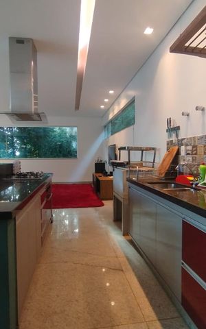 Casa de condomínio à venda com 400m², 4 quartos e 4 vagas Casa de condomínio à venda com 400m², 4 quartos e 4 vagasCozinha