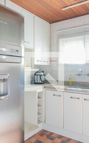 Casa à venda com 100m², 3 quartos e 1 vaga Casa à venda com 100m², 3 quartos e 1 vagaCozinha