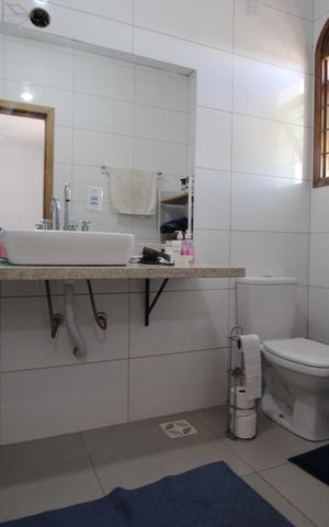 Casa para alugar com 435m², 5 quartos e 4 vagasBanheiro da Suíte 1