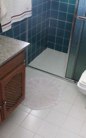Casa à venda com 390m², 4 quartos e 6 vagasBanheiro da Suíte 2