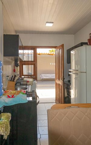 Casa à venda com 120m², 2 quartos e 2 vagas Casa à venda com 120m², 2 quartos e 2 vagasCozinha