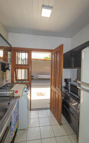 Casa à venda com 120m², 2 quartos e 2 vagas Casa à venda com 120m², 2 quartos e 2 vagasCozinha
