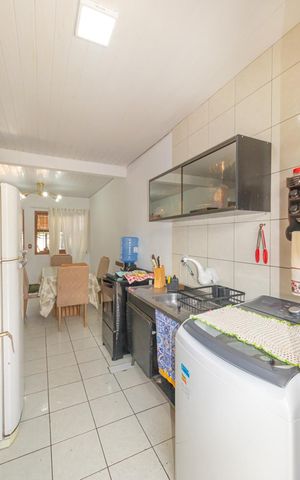 Casa à venda com 120m², 2 quartos e 2 vagas Casa à venda com 120m², 2 quartos e 2 vagasCozinha