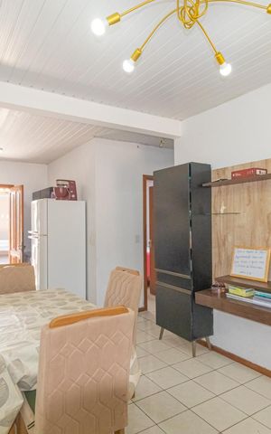 Casa à venda com 120m², 2 quartos e 2 vagas Casa à venda com 120m², 2 quartos e 2 vagasSala