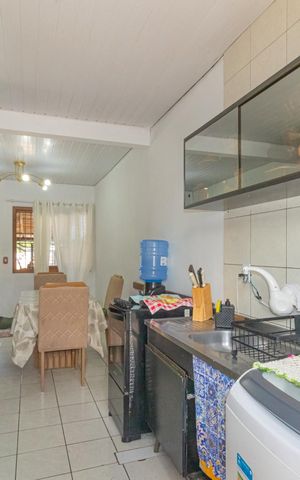 Casa à venda com 120m², 2 quartos e 2 vagas Casa à venda com 120m², 2 quartos e 2 vagasCozinha