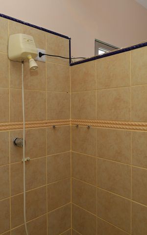 Casa à venda com 326m², 4 quartos e 5 vagasBanheiro 1 - Suíte