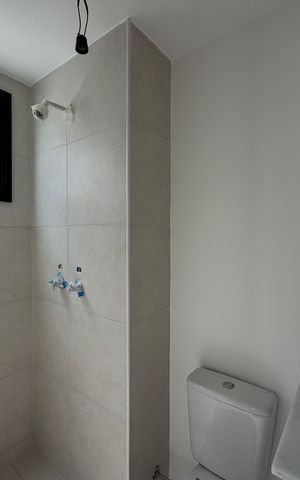 Apartamento à venda com 46m², 2 quartos e 1 vaga Apartamento à venda com 46m², 2 quartos e 1 vagaBanheiro da suíte