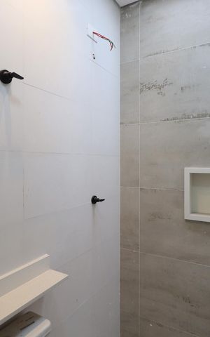 Casa à venda com 150m², 4 quartos e 2 vagasBanheiro da Suíte 2