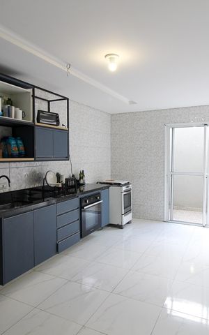 Casa à venda com 84m², 2 quartos e 2 vagas Casa à venda com 84m², 2 quartos e 2 vagasCozinha