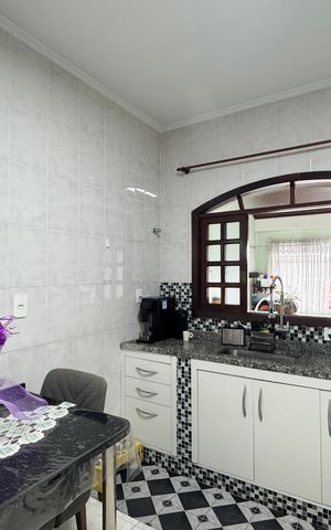 Casa à venda com 125m², 2 quartos e 2 vagas Casa à venda com 125m², 2 quartos e 2 vagasCozinha