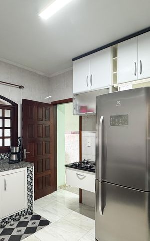 Casa à venda com 125m², 2 quartos e 2 vagas Casa à venda com 125m², 2 quartos e 2 vagasCozinha