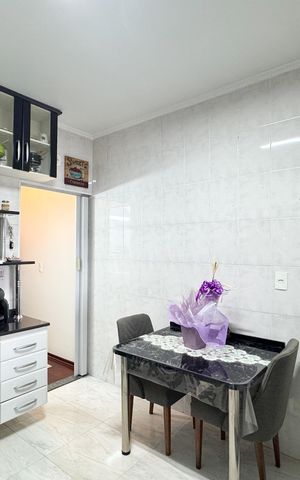 Casa à venda com 125m², 2 quartos e 2 vagas Casa à venda com 125m², 2 quartos e 2 vagasCozinha