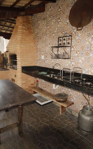 Casa à venda com 390m², 5 quartos e 6 vagasÁrea gourmet