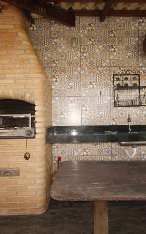 Casa à venda com 390m², 5 quartos e 6 vagasÁrea gourmet