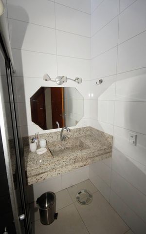 Casa à venda com 390m², 5 quartos e 6 vagasbanheiro 2
