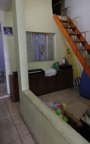 Casa à venda com 100m², 2 quartos e 2 vagasCorredor