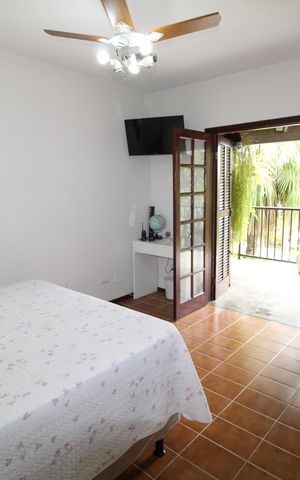 Casa de condomínio para alugar com 464m², 5 quartos e 9 vagasSuíte 1
