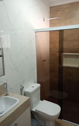 Casa à venda com 65m², 2 quartos e 1 vaga Casa à venda com 65m², 2 quartos e 1 vagaBanheiro