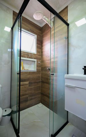 Casa à venda com 125m², 3 quartos e 2 vagasBanheiro Suíte 2