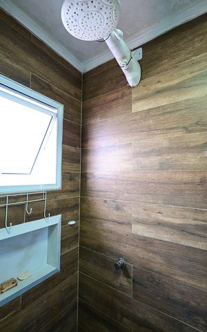 Casa à venda com 125m², 3 quartos e 2 vagasChuveiro do Banheiro da Suíte 2