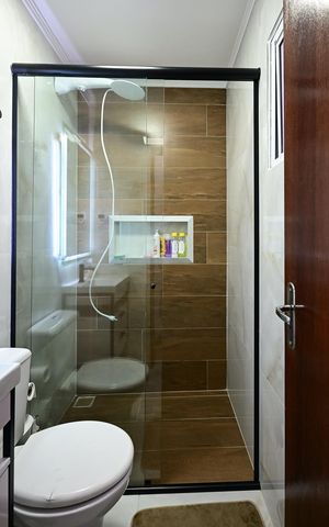 Casa à venda com 125m², 3 quartos e 2 vagasBanheiro Suíte 1