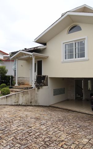 Casa de condomínio para alugar com 405m², 4 quartos e 4 vagasFachada