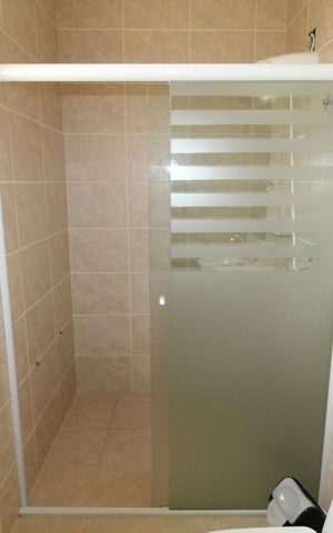 Casa de condomínio para alugar com 405m², 4 quartos e 4 vagasBanheiro da Suíte 1