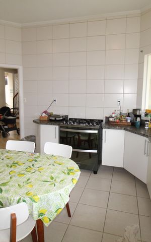 Casa de condomínio para alugar com 405m², 4 quartos e 4 vagasCozinha
