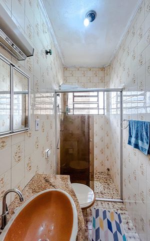 Casa à venda com 240m², 4 quartos e 2 vagasBanheiro da Suíte