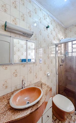 Casa à venda com 240m², 4 quartos e 2 vagasSuíte