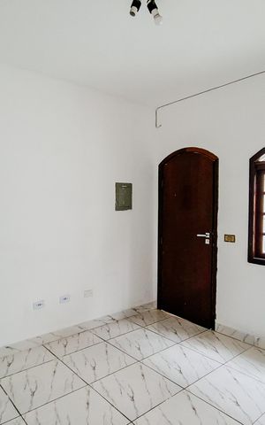 Casa à venda com 86m², 2 quartos e 2 vagasSala