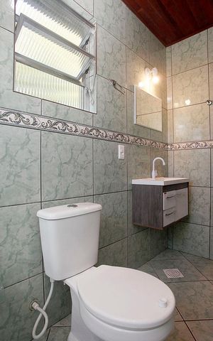 Casa à venda com 120m², 3 quartos e sem vagaBanheiro 2