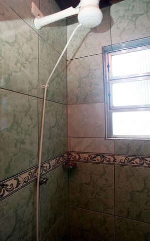 Casa à venda com 120m², 3 quartos e sem vagaBanheiro 2