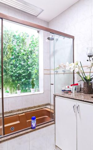 Casa à venda com 400m², 4 quartos e 3 vagas Casa à venda com 400m², 4 quartos e 3 vagasBanheiro da Suíte