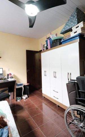 Casa à venda com 109m², 4 quartos e sem vagaQuarto 1