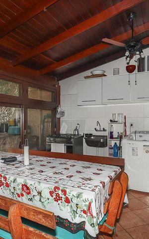 Casa à venda com 200m², 3 quartos e 4 vagasEspaço de lazer / fundos