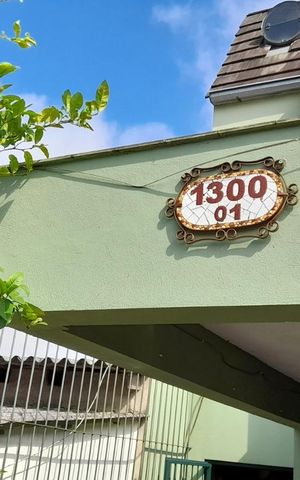 Casa à venda com 253m², 4 quartos e 2 vagas Casa à venda com 253m², 4 quartos e 2 vagasFachada