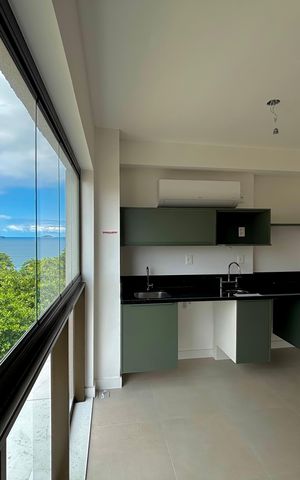 Apartamento à venda com 71m², 2 quartos e 1 vaga Apartamento à venda com 71m², 2 quartos e 1 vagaVaranda da suíte/cozinha/área de serviço - vista para o mar