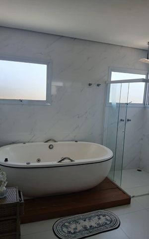 Casa de condomínio para alugar com 350m², 4 quartos e 4 vagas